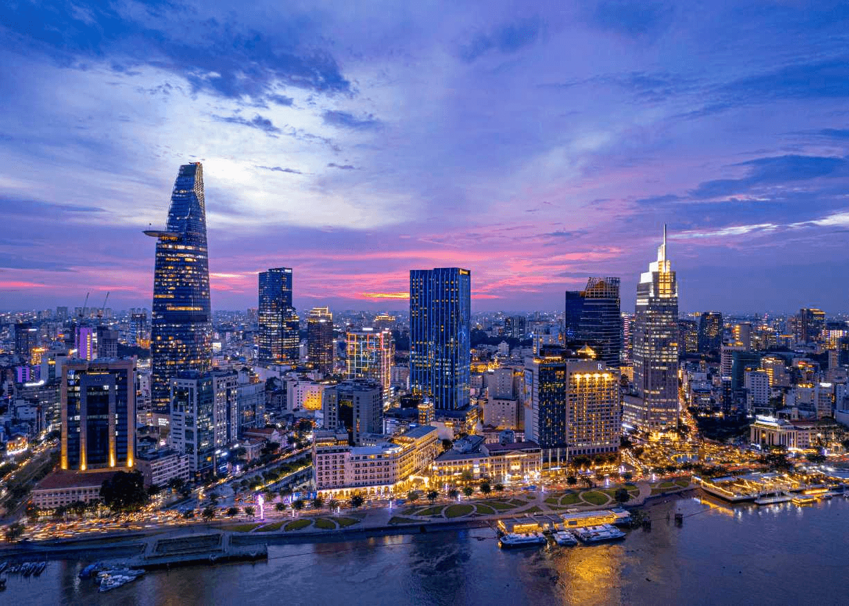 Ho Chi Minh City skyline at sunset showing Bitexco Tower and modern urban development